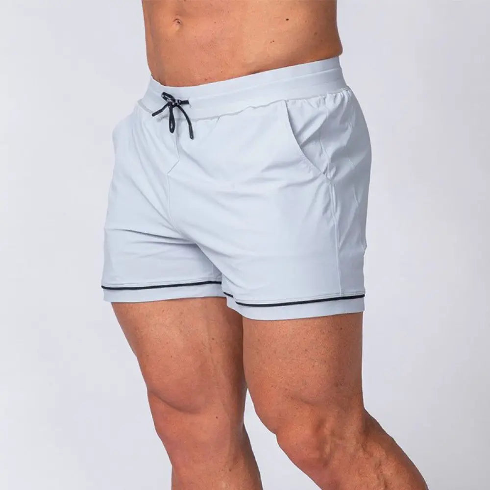 Men’s quick-dry light gray athletic 2-in-1 shorts with black drawstring and trim for multi-sport performance
