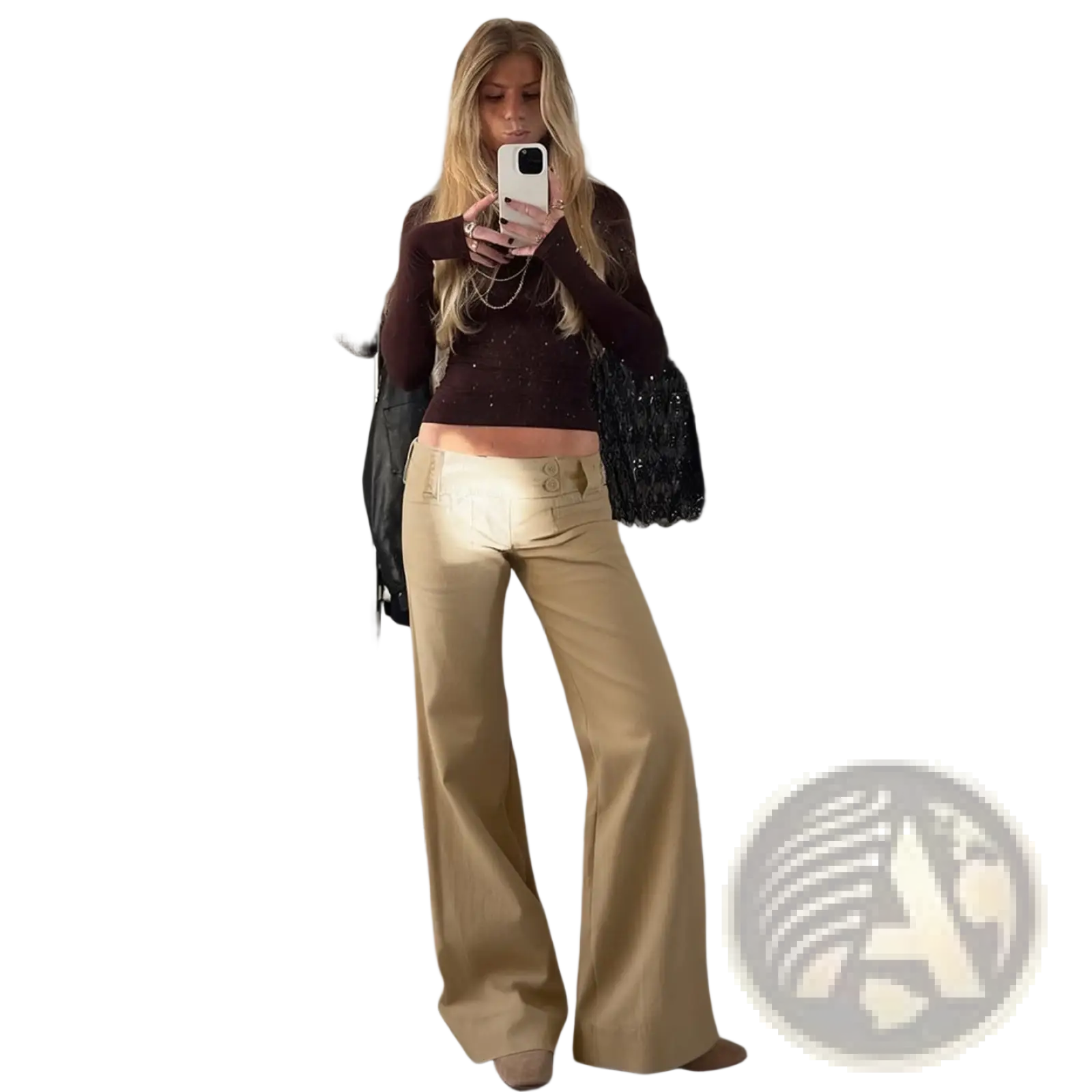 Flared tan low rise trousers in smooth glossy fabric with wide legs and two front buttons at the waistband