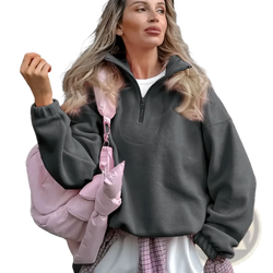 Pink puffer bag with shiny quilted exterior and adjustable strap paired with fleece half zip sweatshirt casual pullover