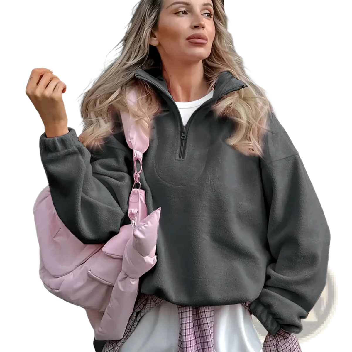 Pink puffer bag with shiny quilted exterior and adjustable strap paired with fleece half zip sweatshirt casual pullover