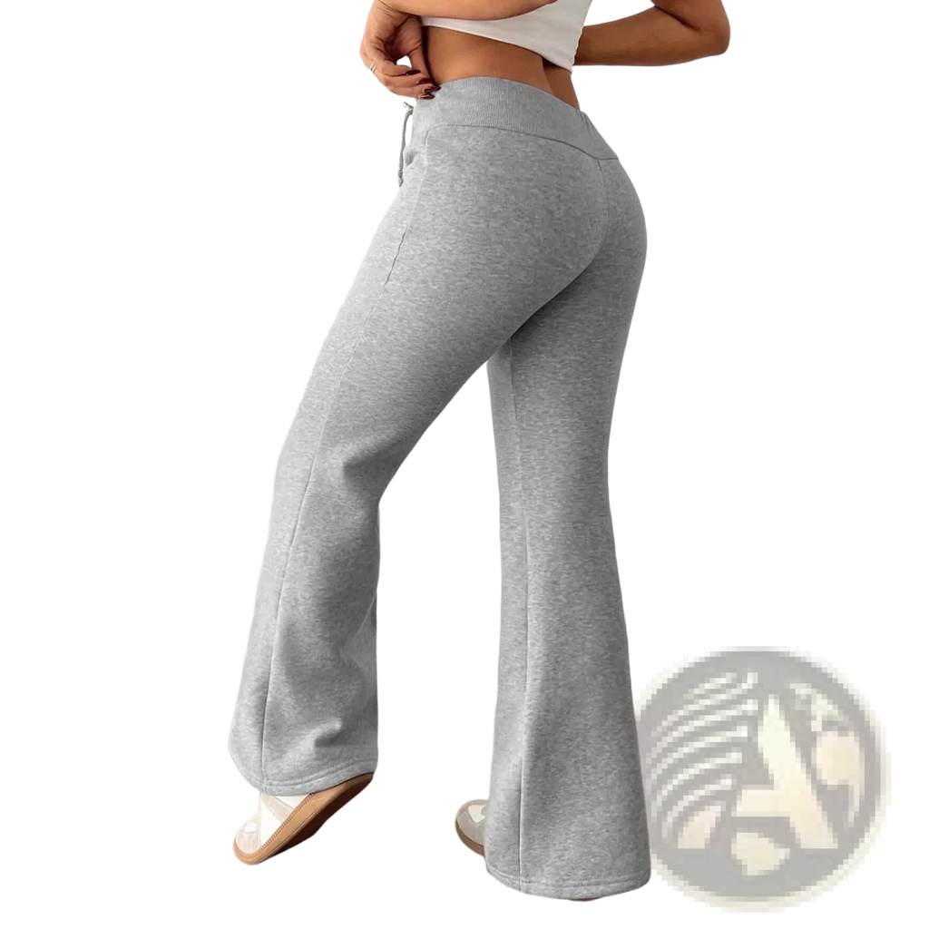 Gray heathered fleece lined high waist flared sweatpants with a drawstring waistband for comfortable wear
