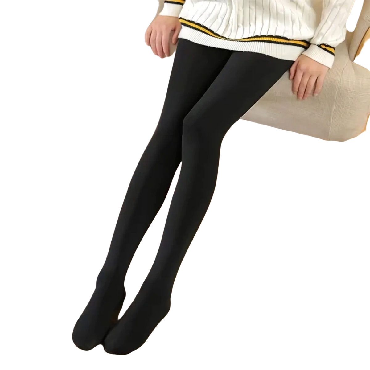 Fleece lined high waist thermal black tights with smooth texture worn with a white sweater in front view