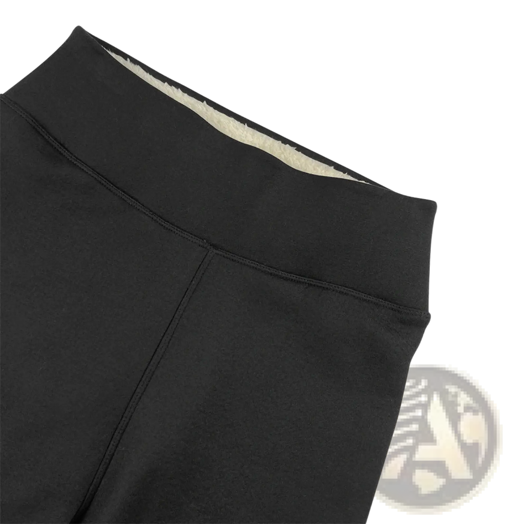 Black high waisted winter leggings with plush cream colored fleece lining for cold weather warmth and comfort