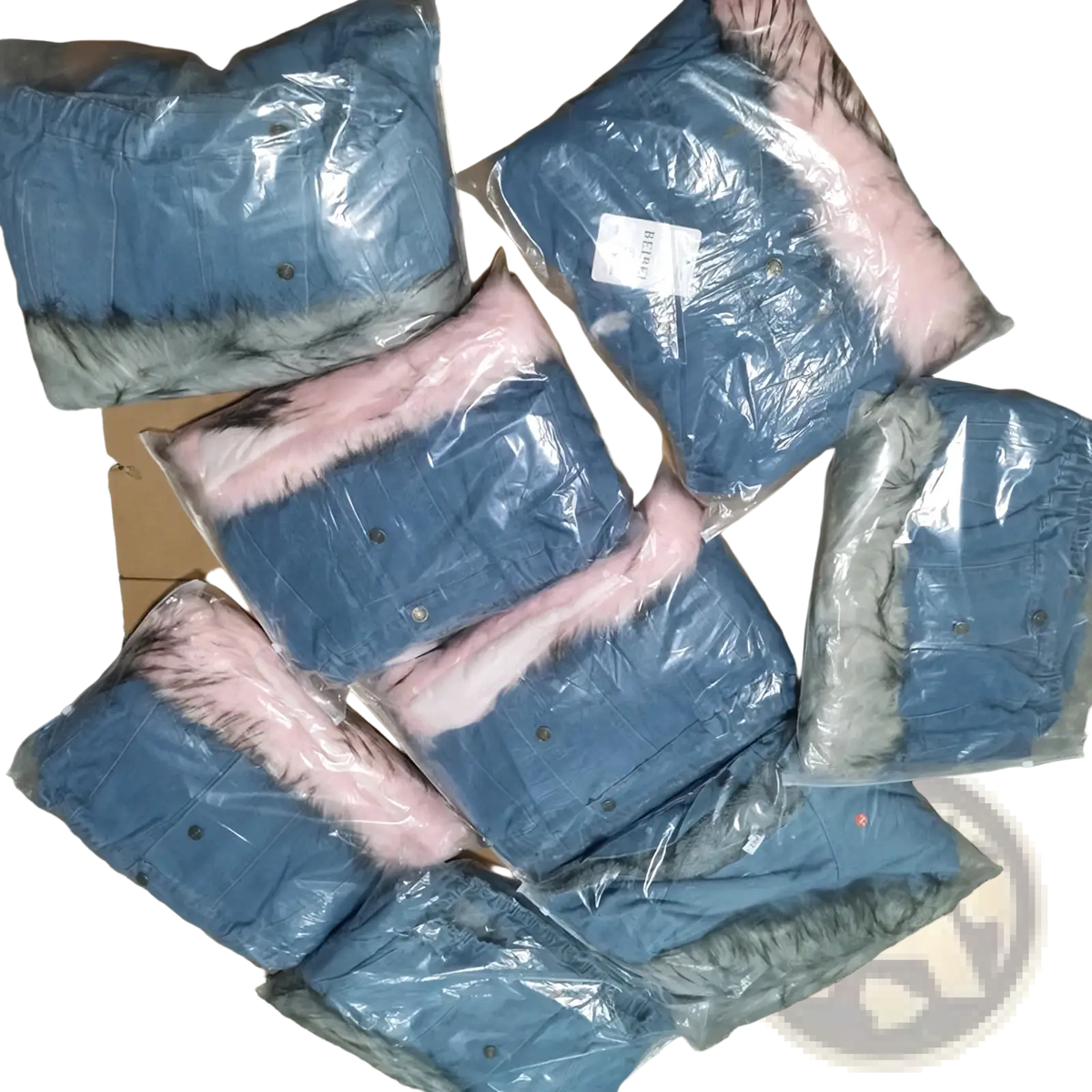 Fleece lined hooded denim jackets in blue with pink and gray faux fur collars packaged in clear plastic bags