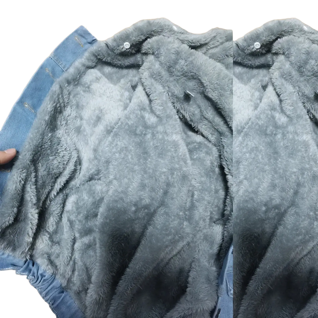 Gray fleece lined hooded denim jacket with plush fleece lining and visible button closures on soft textured interior