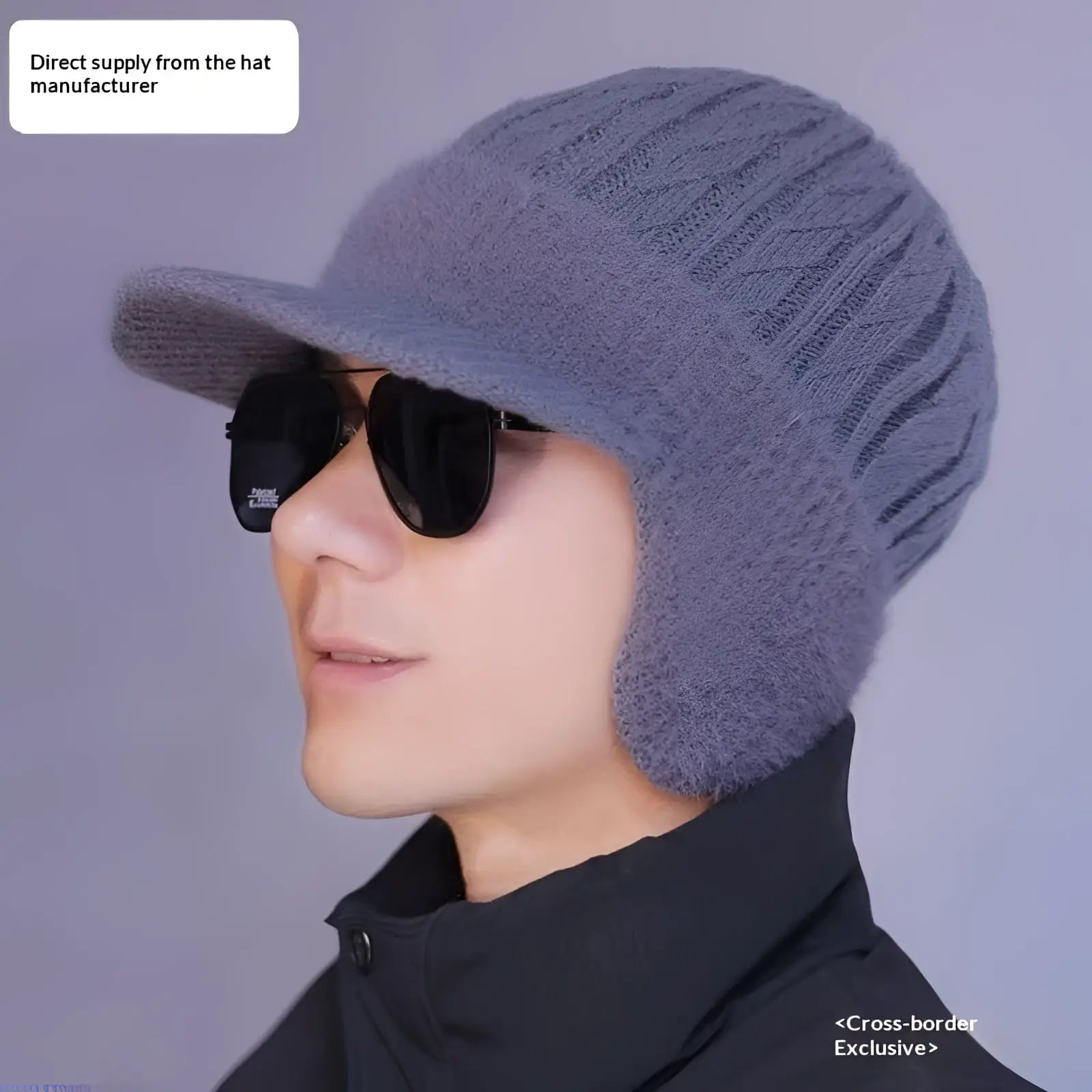 A cozy gray fleece lined knitted beanie with ear flaps and a structured brim for winter warmth
