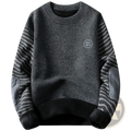 Dark gray fleece lined patchwork mens winter sweater with striped knit sleeves and faux leather elbow patches