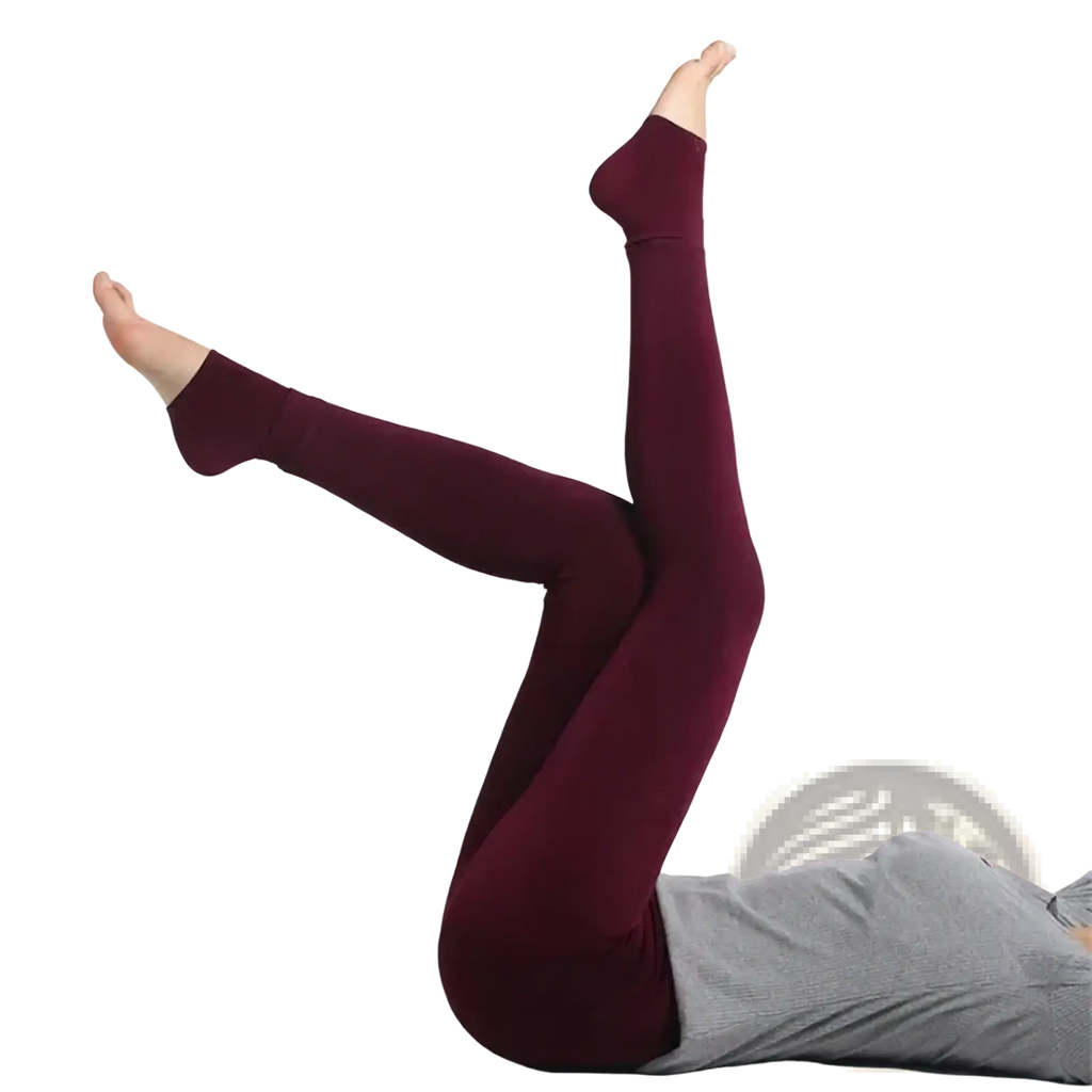 Maroon fleece lined winter thermal pantyhose with a snug fit and ribbed cuffs for cold weather comfort