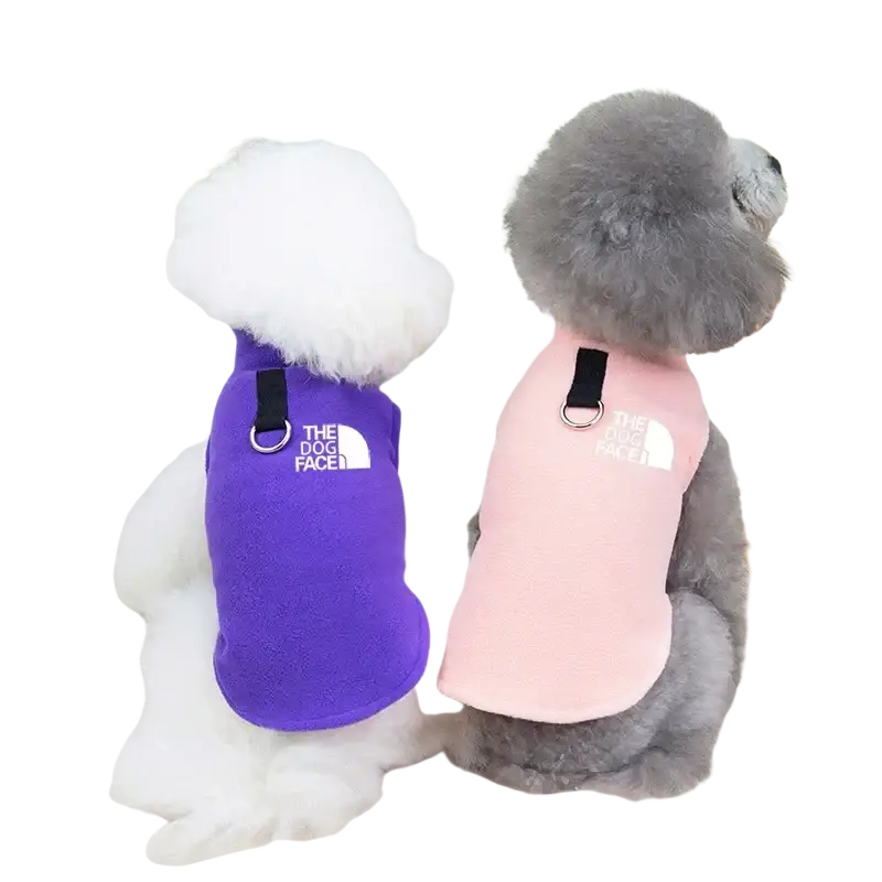 Purple and pink fleece warm dog vests with the North Face logo and black straps for small to medium dogs back side view