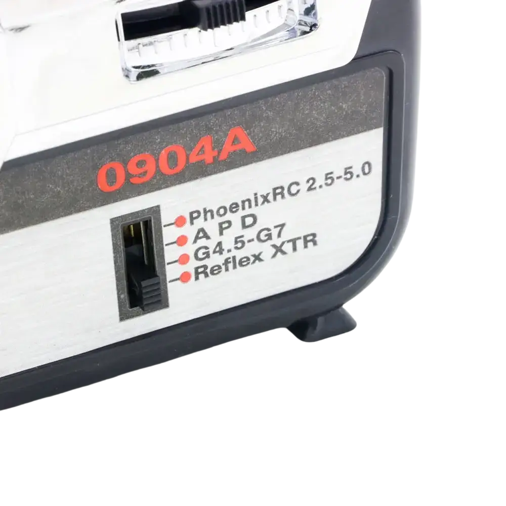 Back side of black and silver phoenixrc 0904a matte radio receiver with labeled ports for flight simulator remote control channel settings