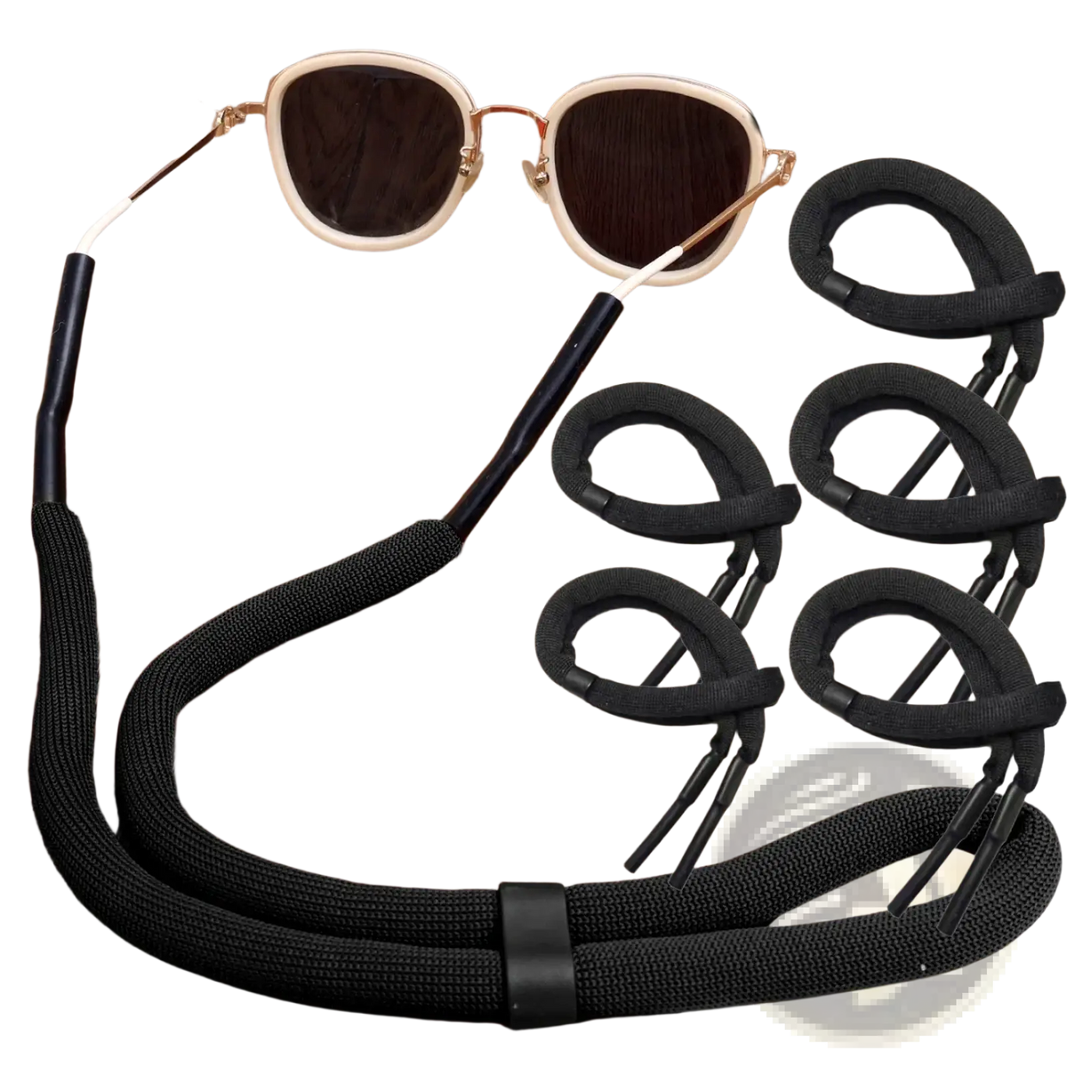 Black woven fabric floating eyeglass strap with adjustable elastic loops and central black plastic buckle for water sports