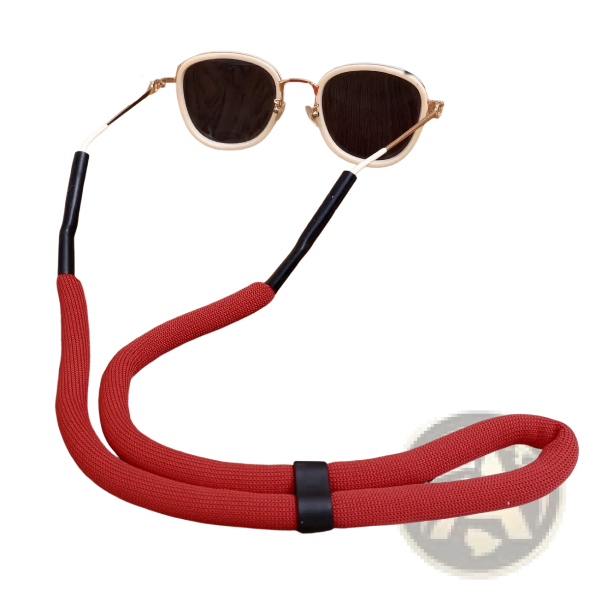 Red woven fabric floating eyeglass strap with black plastic ends and central clasp for water sports use