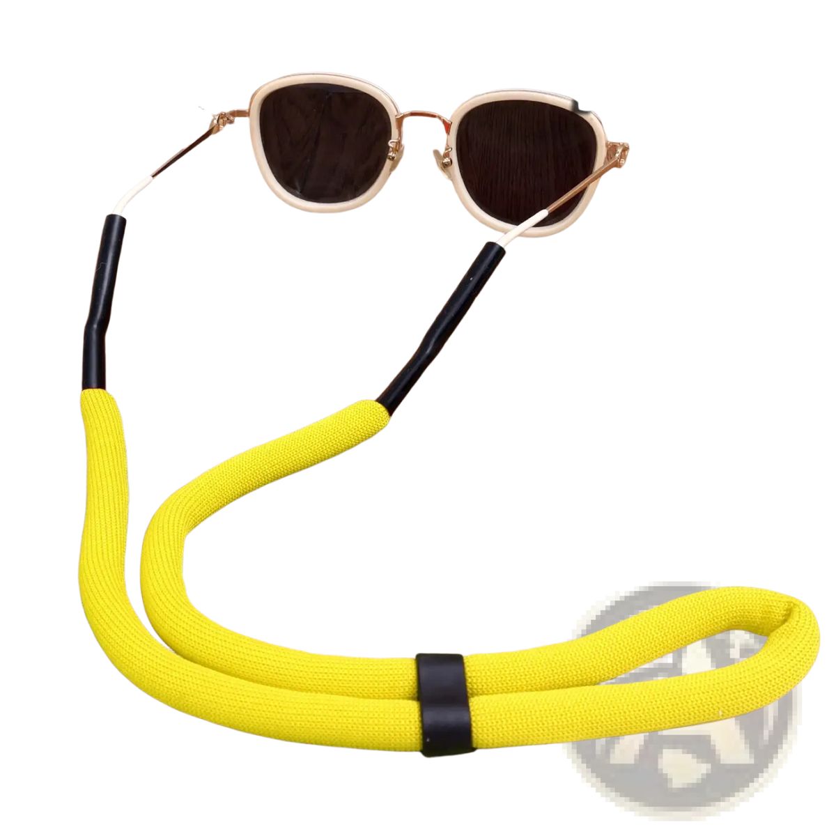 Bright yellow textured floating eyeglass strap with black plastic ends and central band for water sports use