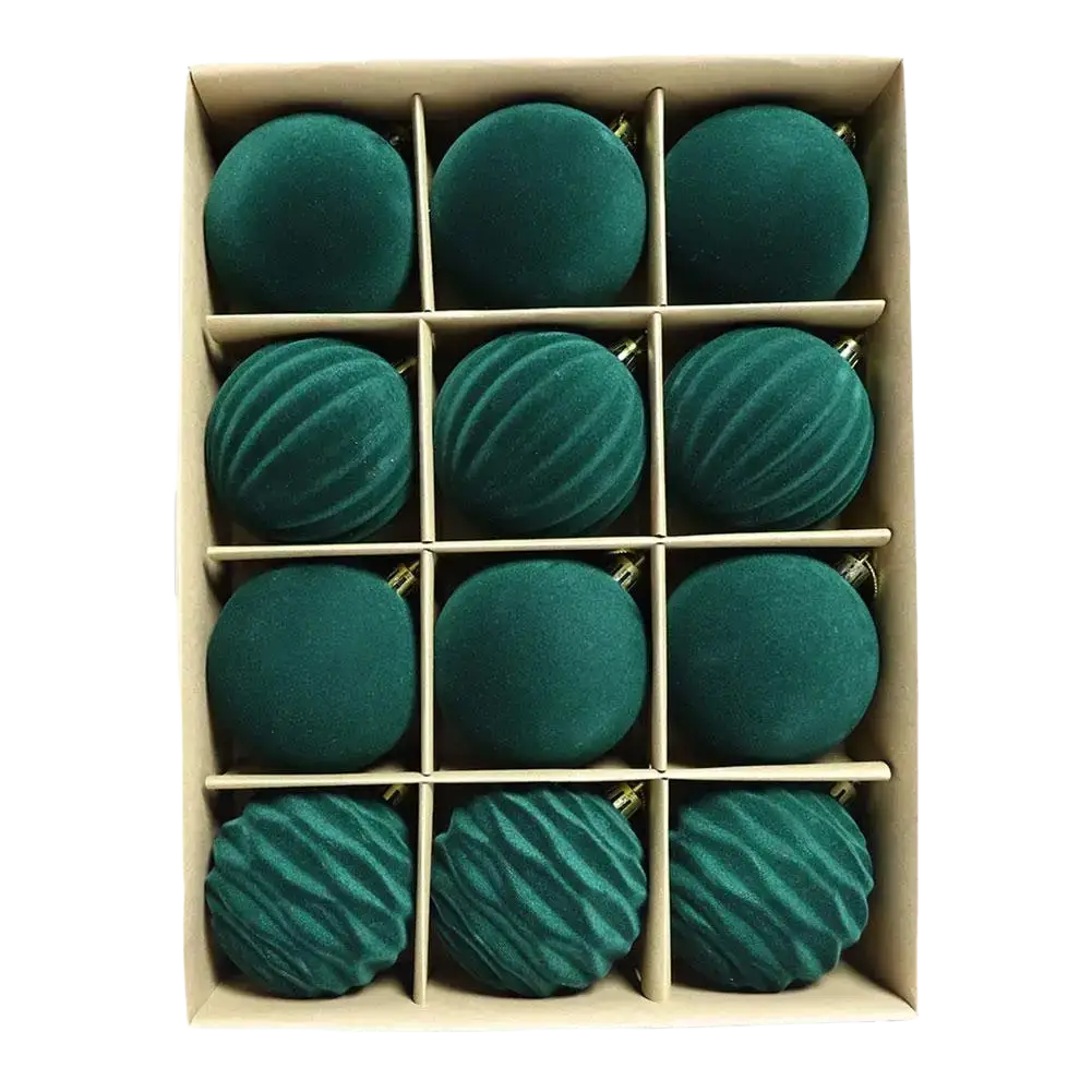 Set of twelve emerald green flocked christmas balls made of velvet with ribbed texture and gold caps for holiday decor