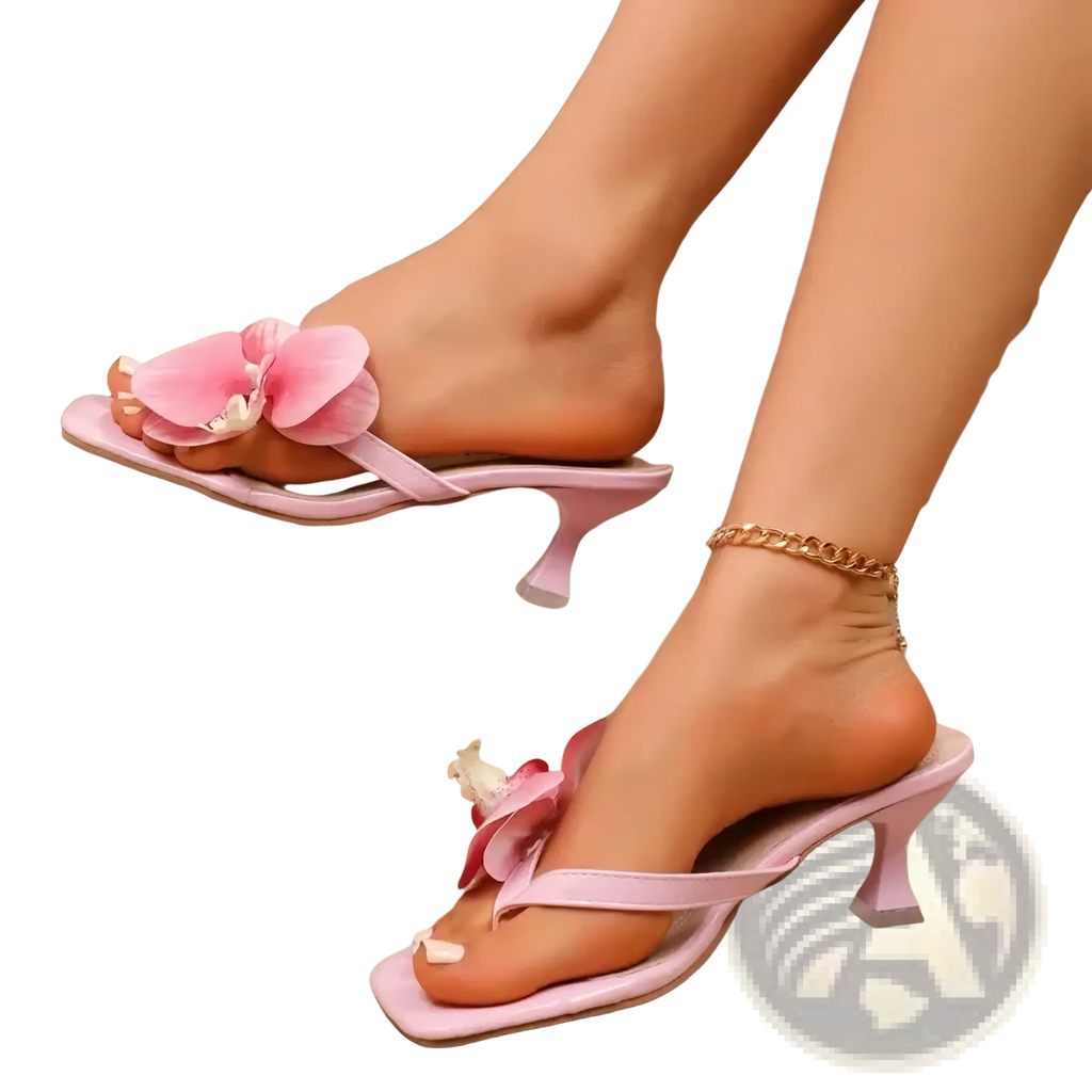 Floral block heel mule sandals in pink satin with orchid adornments and low block heels for elegant wear