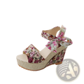 Floral bohemian platform wedge sandal with woven beige sole and pink rose pattern on straps with ankle ties