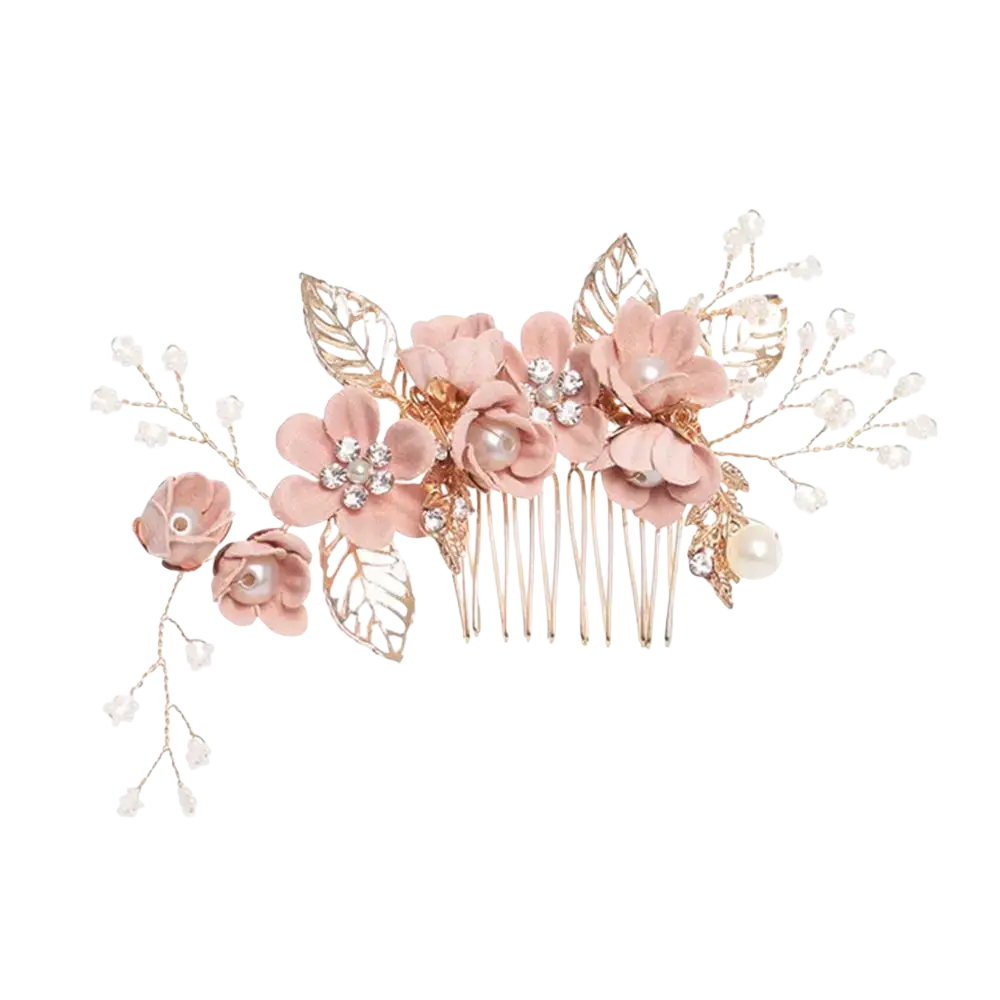 A delicate rose gold floral bridal hair comb with soft pink fabric flowers jeweled centers and pearl accents