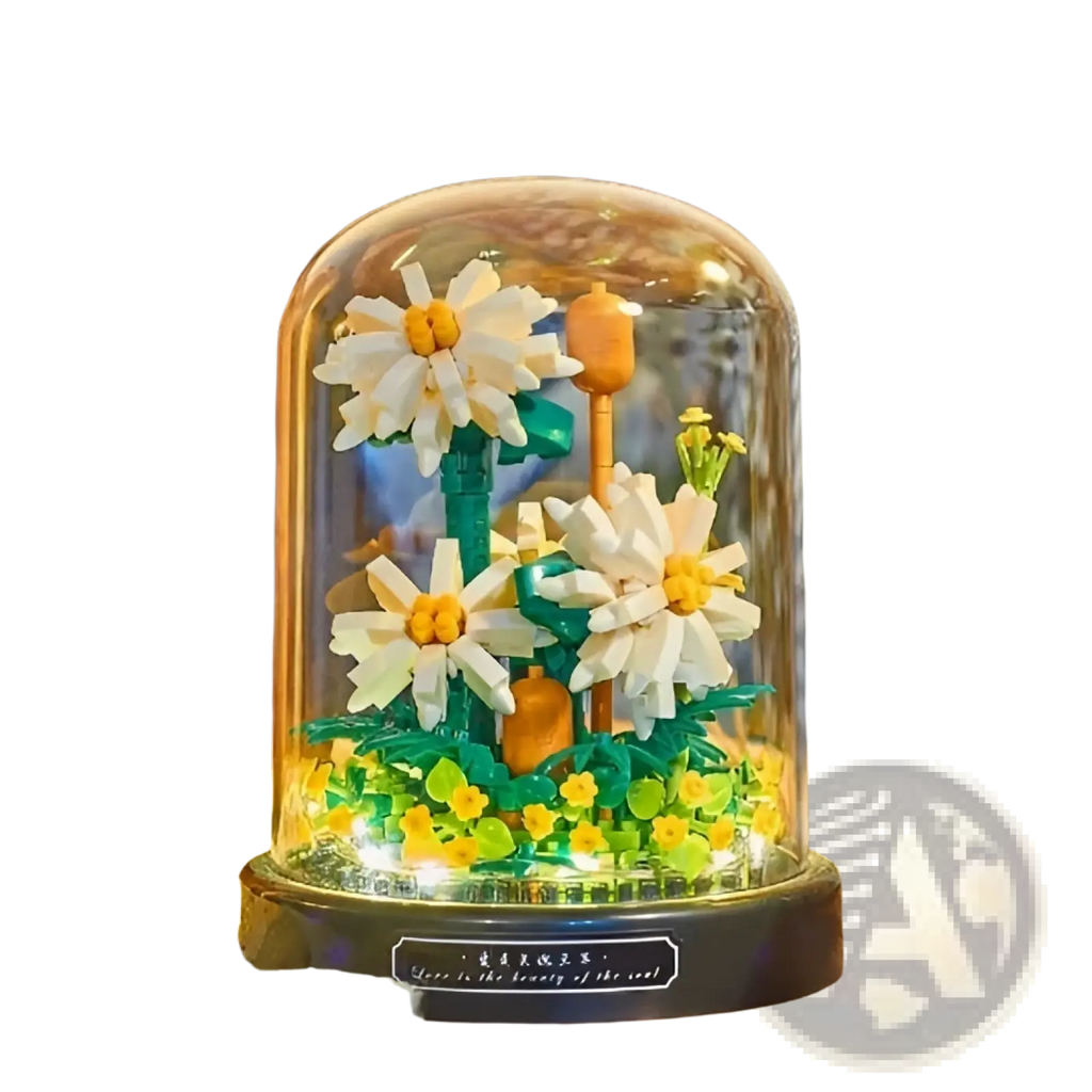 Floral building block bouquet featuring a delicate white daisy arrangement in colorful blocks under a glass dome with warm lighting