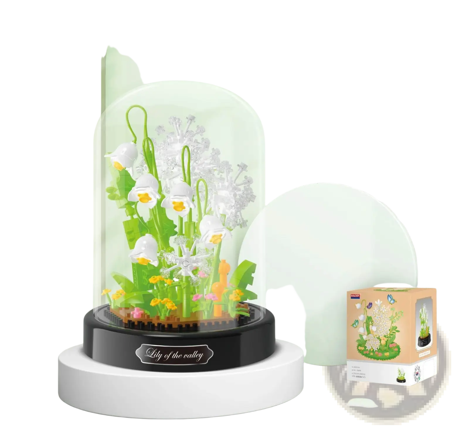 Floral building block bouquet in glass dome with delicate white and green lily of the valley plastic flowers on black base