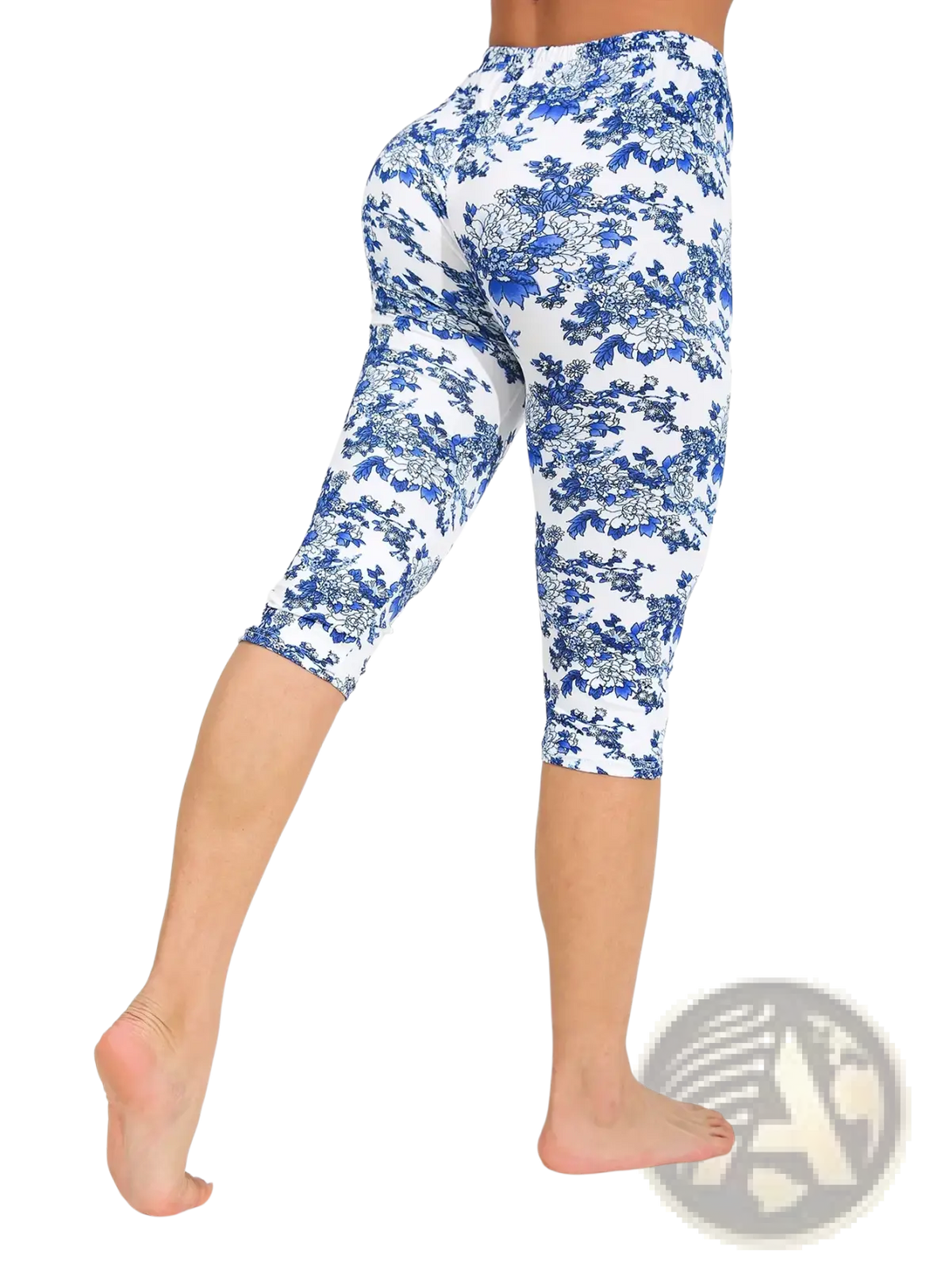 White floral capri yoga leggings with blue pattern designed for comfortable activewear use