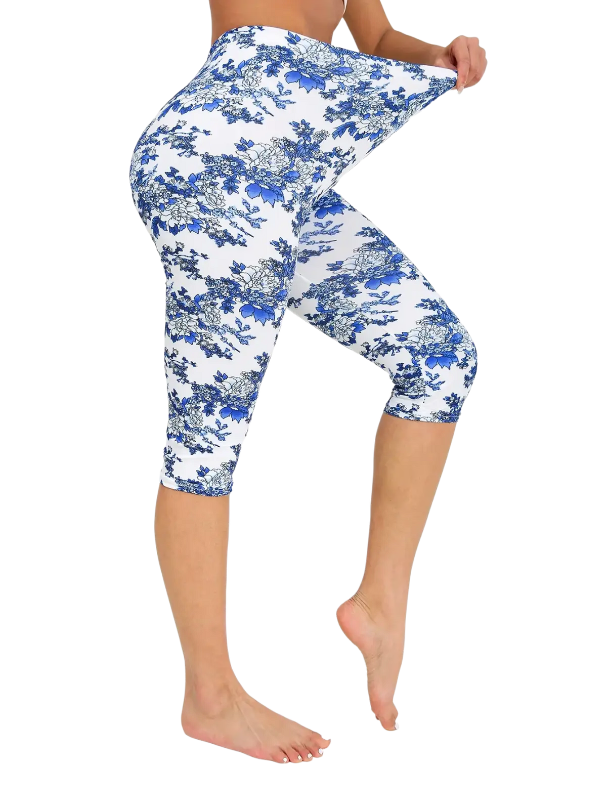 White capri yoga leggings with blue floral pattern designed for comfortable activewear and flexibility