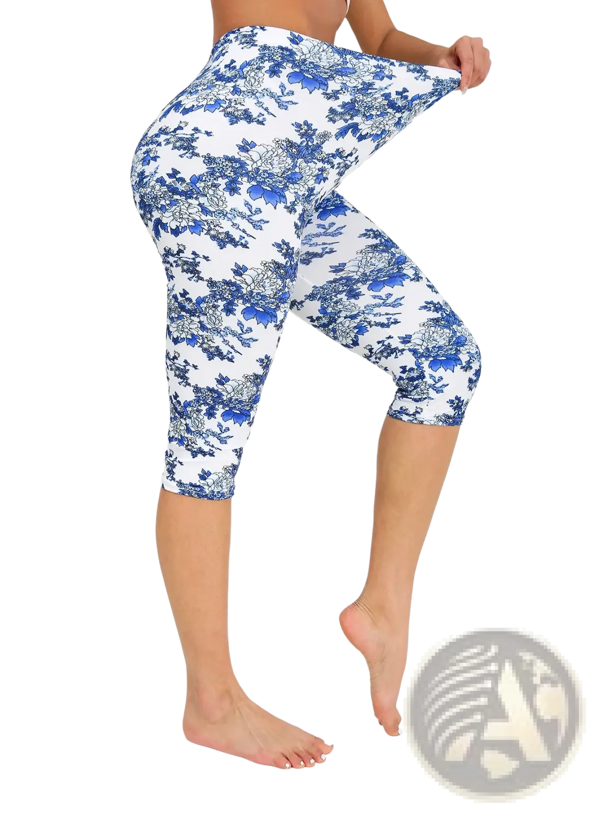 White capri yoga leggings with blue floral pattern designed for comfortable activewear and flexibility