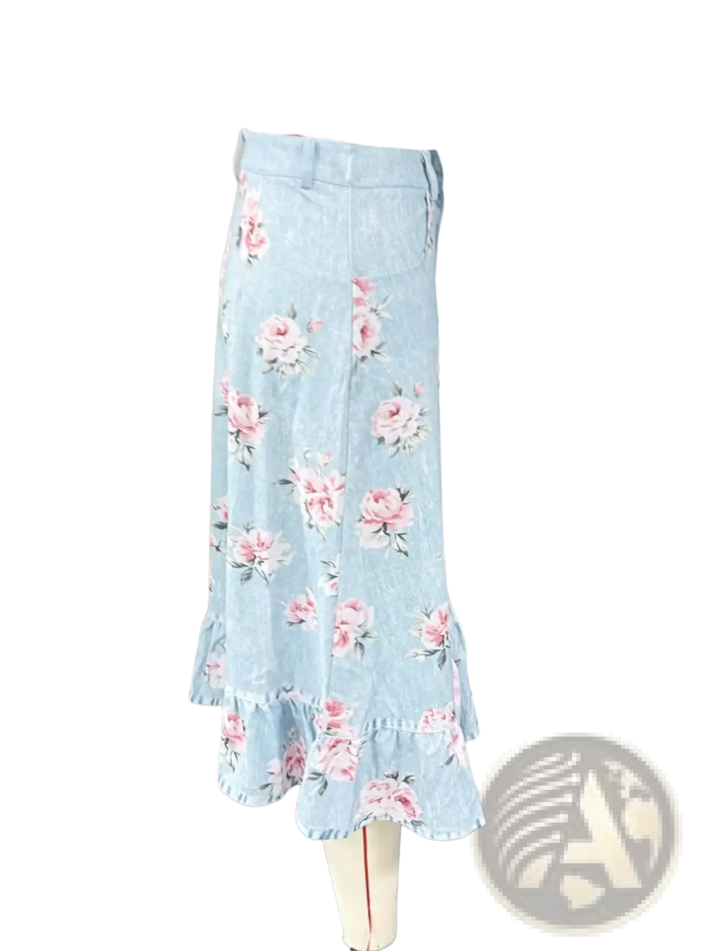 A light blue high waisted denim skirt with pink floral pattern and ruffled a line hemline