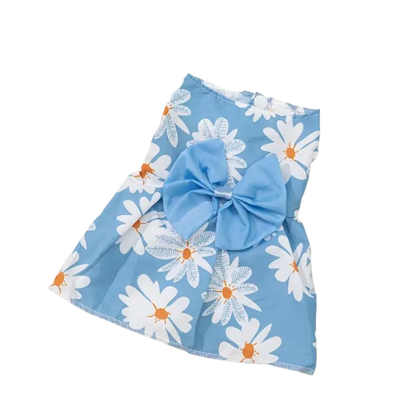 Floral dog princess dress featuring a light blue skirt with white daisies orange centers and a matching waist bow