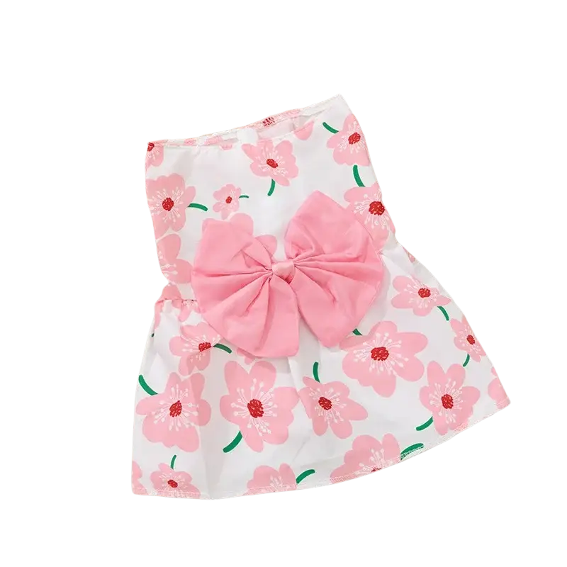 Floral dog princess dress with pink floral patterns and a large matching pink bow at the front on white fabric
