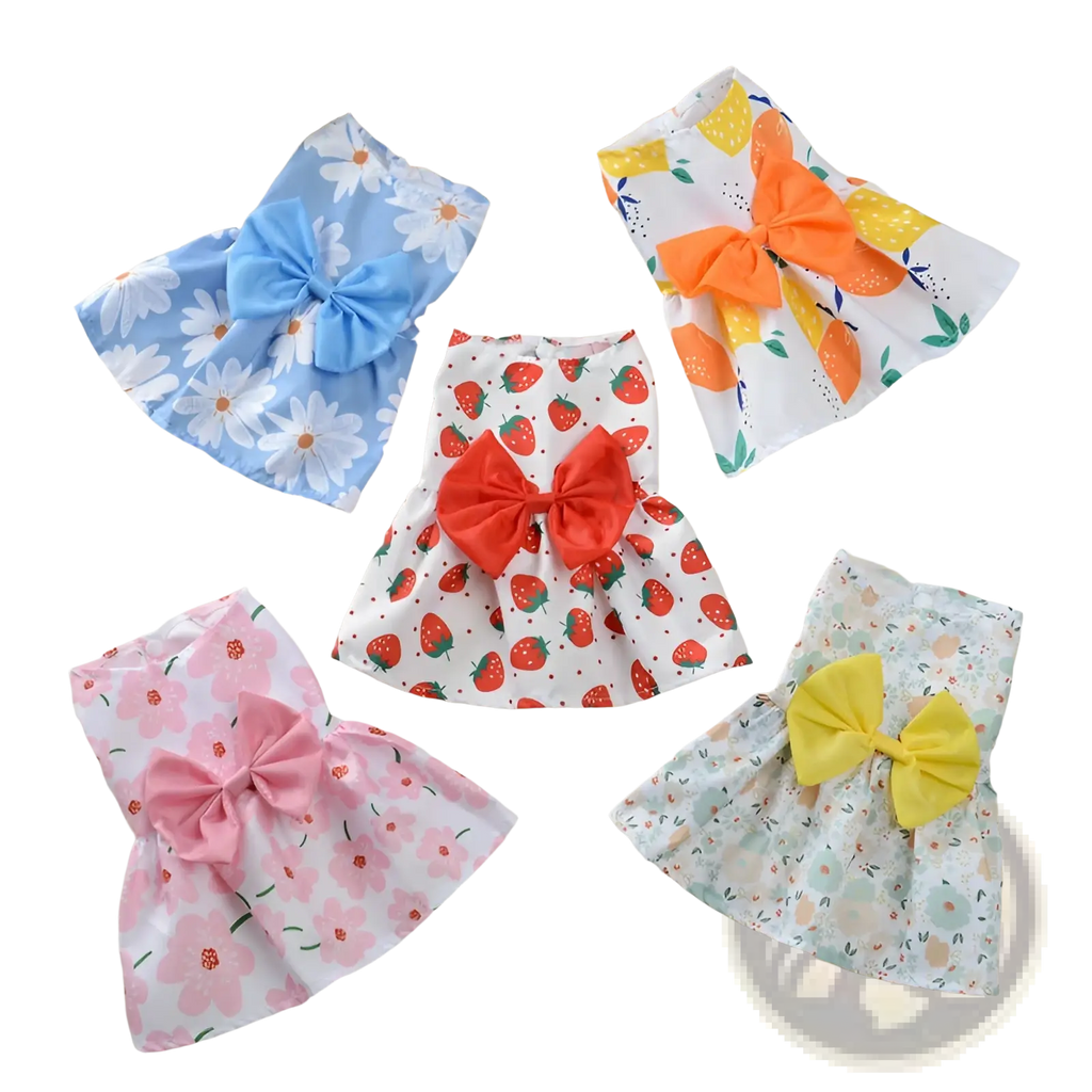 Four colorful floral dog princess dresses for children with large coordinating bows at the waist for pet apparel
