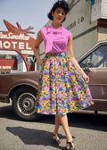 Floral Doris retro cotton midi skirt with pockets featuring a vibrant full flared silhouette and colorful floral print