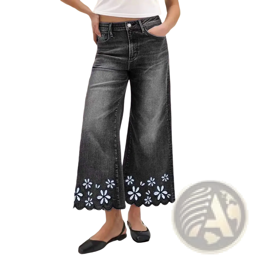 Dark wash denim wide-leg pants with scalloped hem and white floral embroidery cropped for stylish wear