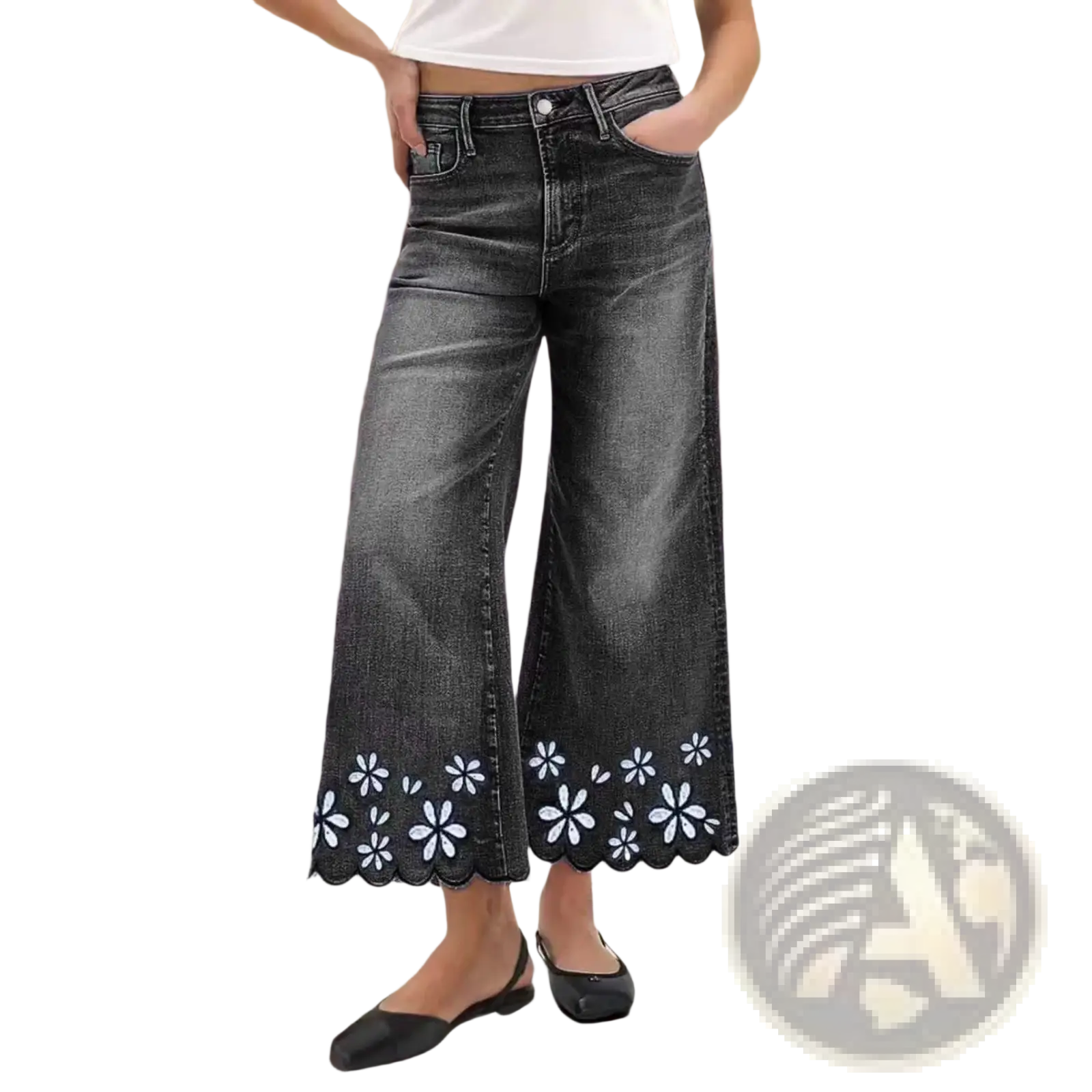 Dark wash denim wide-leg pants with scalloped hem and white floral embroidery cropped for stylish wear