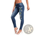 Blue denim high waisted skinny jeans with intricate floral embroidery along the outer leg for stylish wear