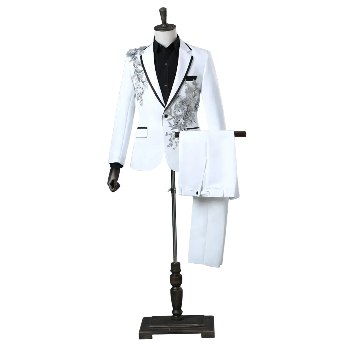 White formal mens tuxedo suit with black trim and silver floral embroidery on the lapels for special occasions