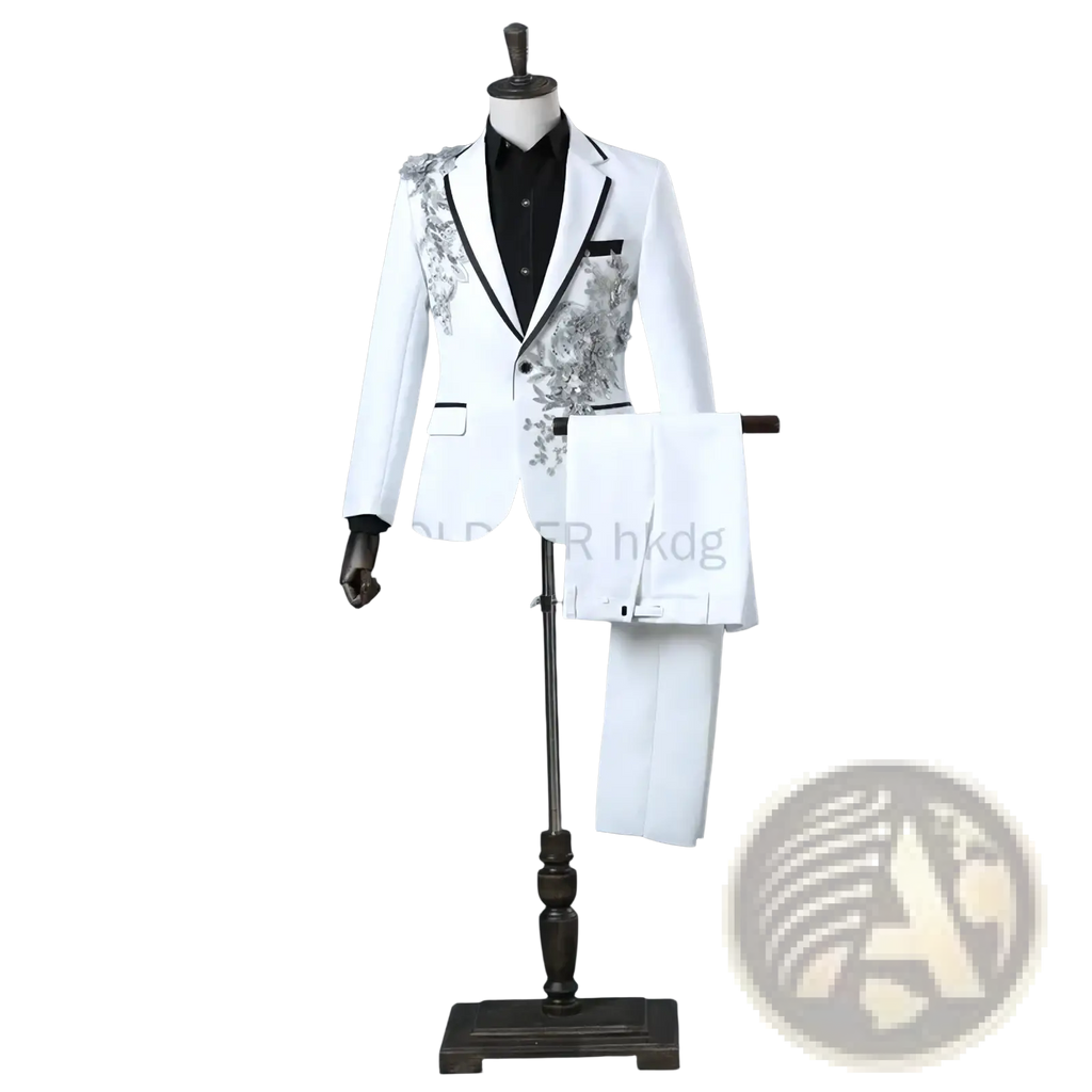 White formal mens tuxedo suit with black trim and silver floral embroidery on lapels and chest displayed on mannequin