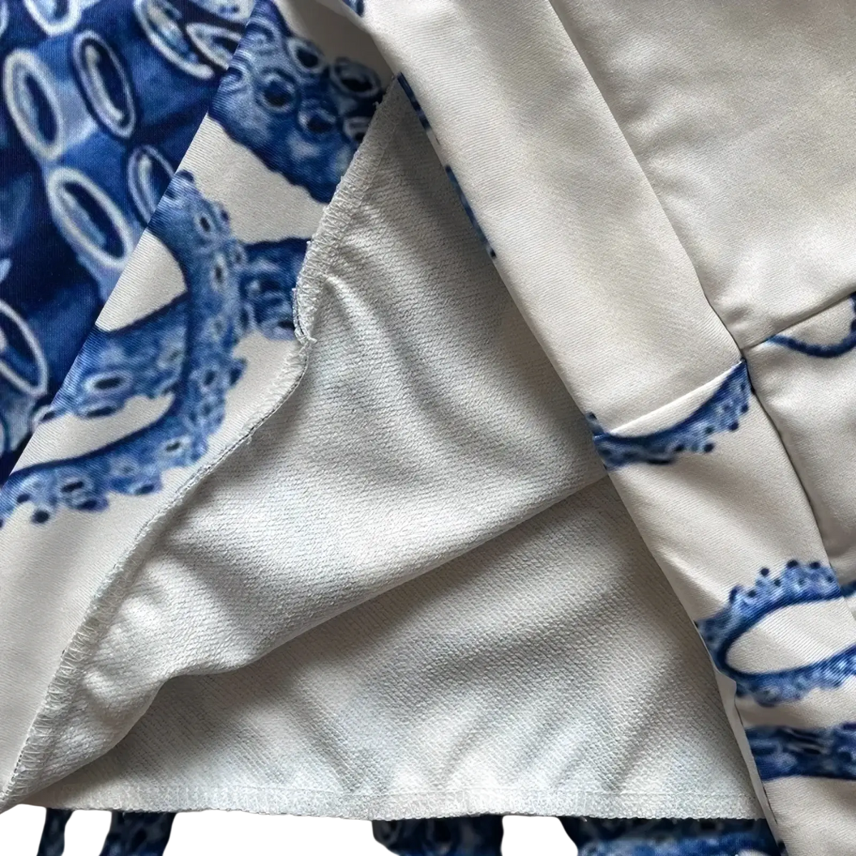 Floral fleece hoodie oversized streetwear sweatshirt in white fabric with blue octopus pattern and detailed stitching