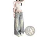 Floral high waist wide leg denim jeans in faded light blue with pink and white blossoms and a pink heart belt buckle