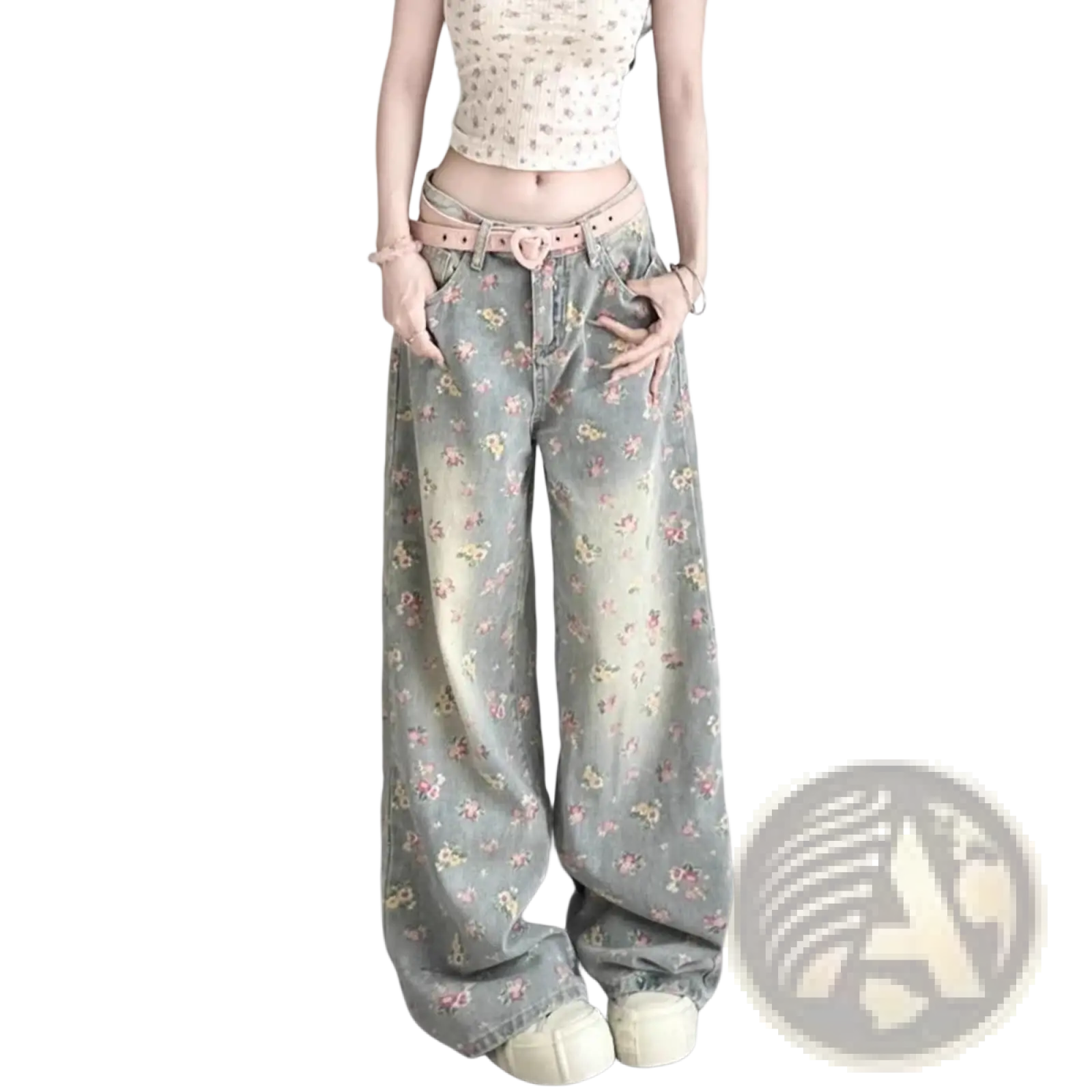 Floral high waist wide leg denim jeans in faded gray with pink and yellow flowers cinched by a pink belt
