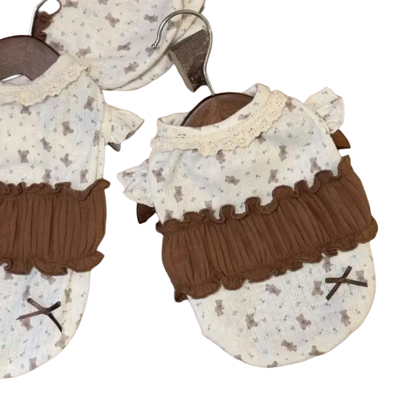 Floral lace dog dress with cute white and brown bear print, lace collar, ruffled layers, and embroidered x eyes