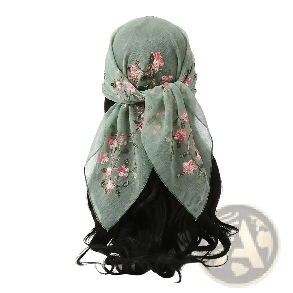 Floral lace hijab wrap shawl mint green chiffon headscarf with pink and silver floral embroidery tied around the neck