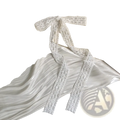 White lace scarf hair bow ribbon wrap featuring delicate floral patterns and a tied bow detail