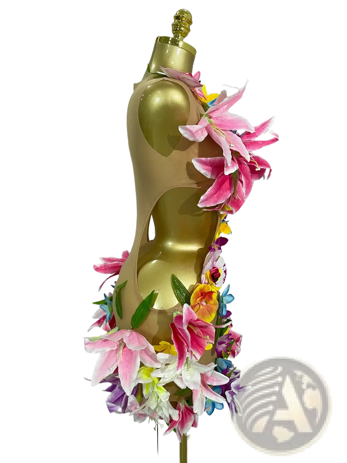 A golden mannequin wearing a floral mesh mini dress adorned with vibrant pink white yellow and purple artificial flowers for party wear