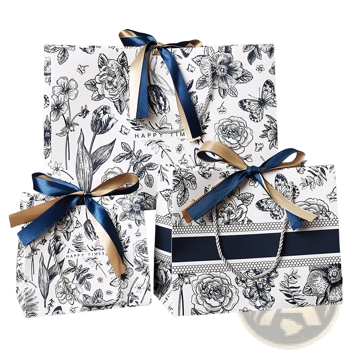 Three elegant floral paper gift bags with black and white patterns accented by navy blue and gold ribbons