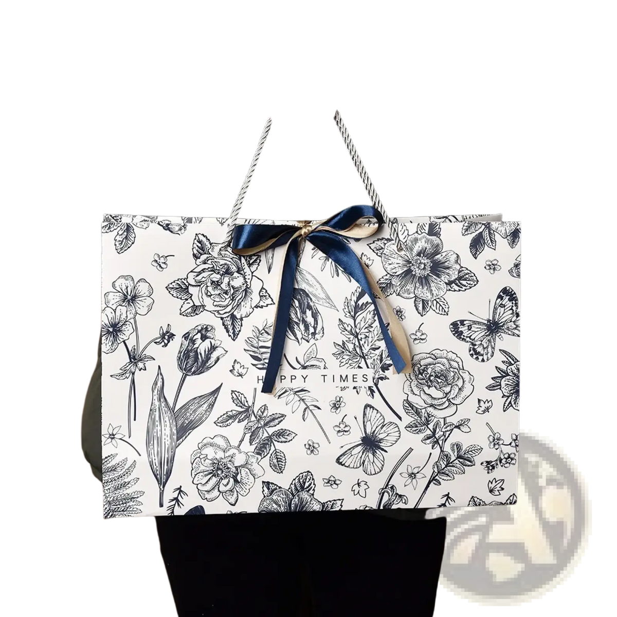 White paper shopping bag with black botanical illustrations and navy blue ribbon bow floral paper gift bag with ribbon