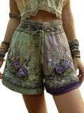Floral patchwork pastel casual shorts featuring green and purple embroidered flowers with lace trim for a stylish look