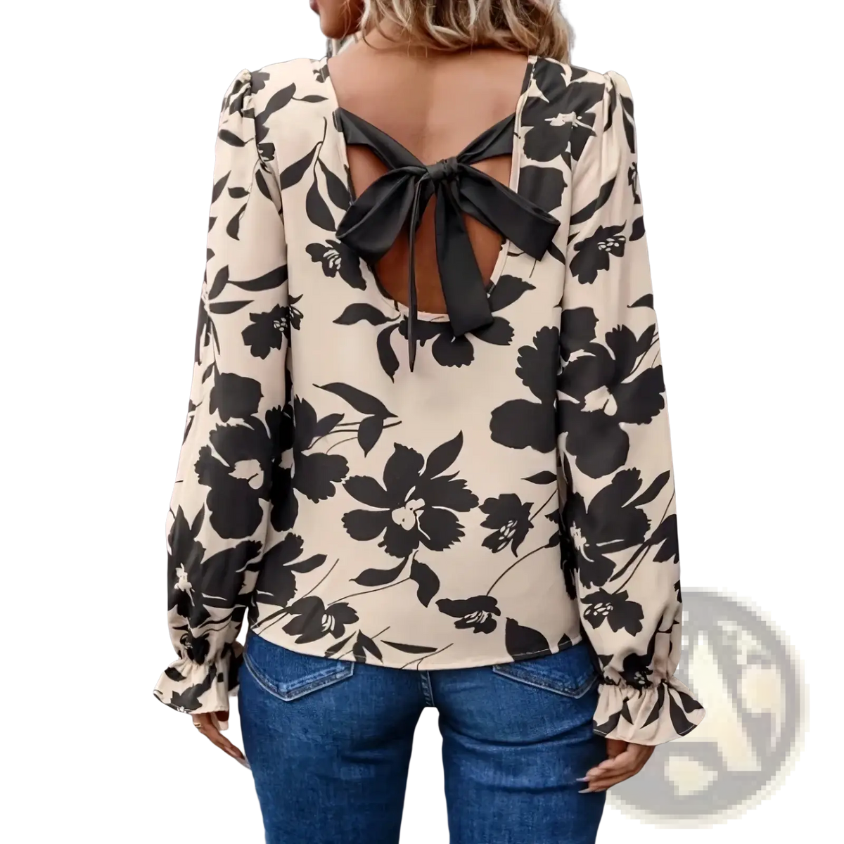 Beige floral print backless blouse with black oversized flowers and a tied bow detail at the back