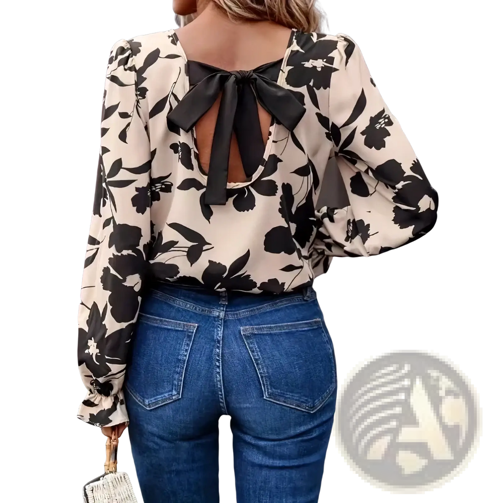 Beige floral print backless blouse with black pattern and elegant bow detail on the back side