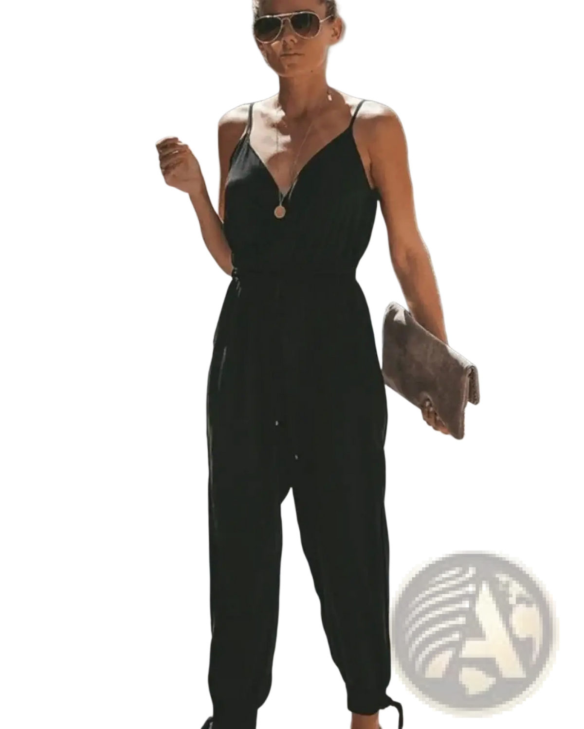 Black sleeveless jumpsuit with thin straps and v-neckline perfect for summer boho floral print style