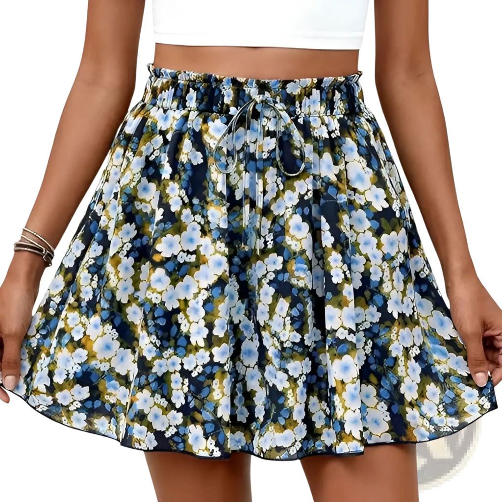 Floral print high waisted a line shorts with elastic waistband and drawstring featuring blue white and yellow flowers on navy background